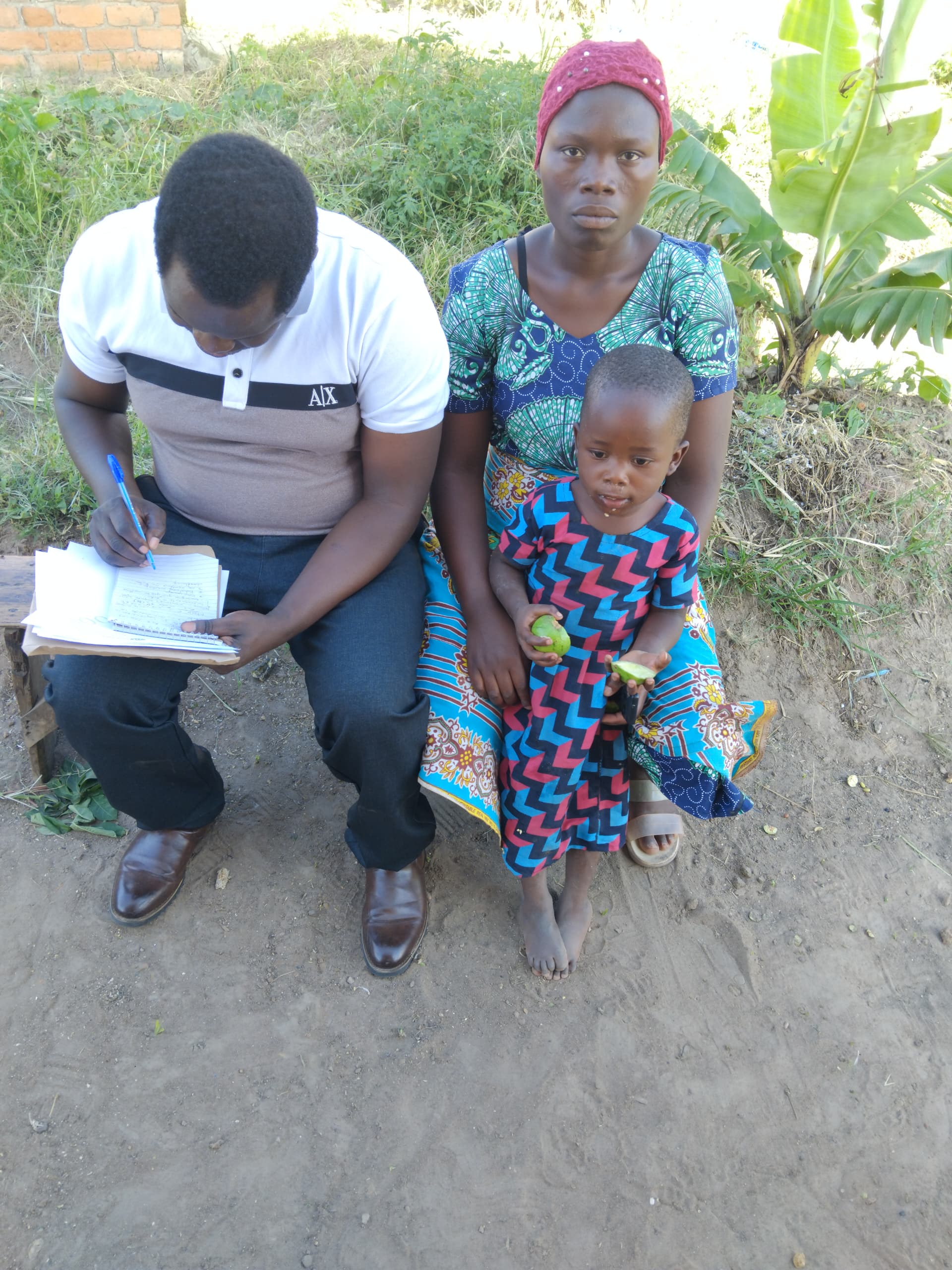 Enumerator confirming consent with caregiver before interview