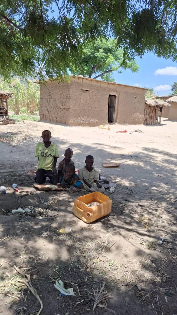 Enumerator greeted by village elder at arrival
